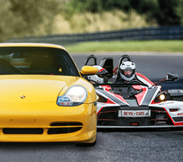 KTM X-BOW vs. Porsche 911 Carrera KTM X-BOW vs. Porsche 911 Carrera